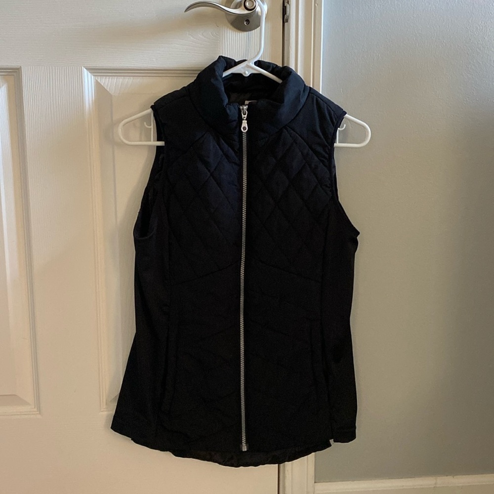 Maurice’s small black vest
